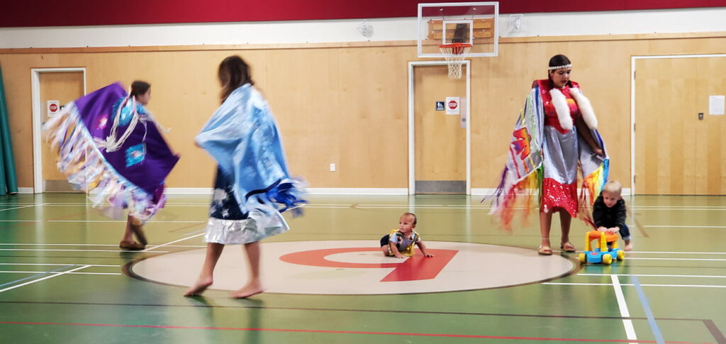 Girls dancing in their Shawl dresses