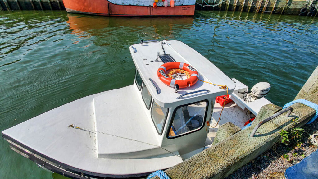 Just Swell, my dad's boat docked in Habourville