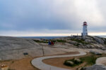 Peggy's Point Lighthouse overlooking the granite rocks and accessible pathway at Peggy's Cove Nova Scotia
