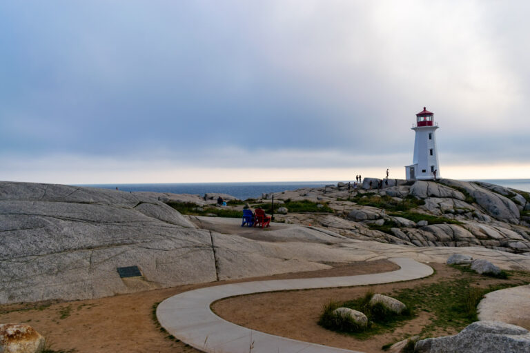 Peggy's Point Lighthouse overlooking the granite rocks and accessible pathway at Peggy's Cove Nova Scotia